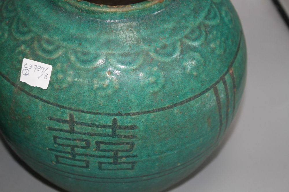 Two 19th century Chinese turquoise glazed shuangxi jars, with calligraphic motifs, height 18cm